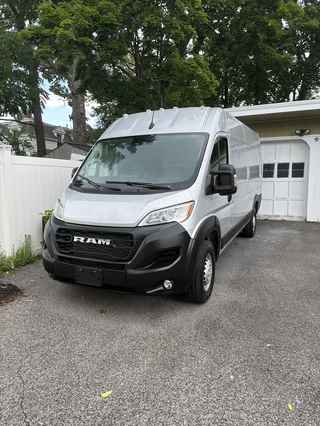 KGY Logistics Unit KGY-01 &mdash; 2026 Ram ProMaster 3500, front three-quarter view, silver